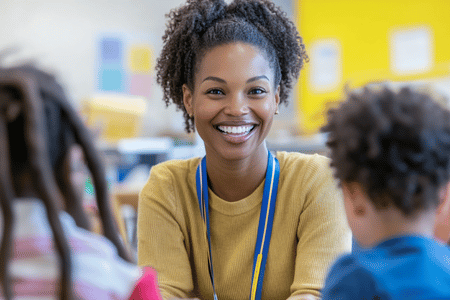 Engaging teacher working with young children in a classroom—perfect representation of Social Story Source’s speech therapy and social story tools for educators.